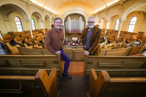 RUTH BONNEVILLE / WINNIPEG FREE PRESS
                                Doug Holroyd (left), chair of church leadership team and Rev. Marc Whitehead at Crescent Fort Rouge United Church.
