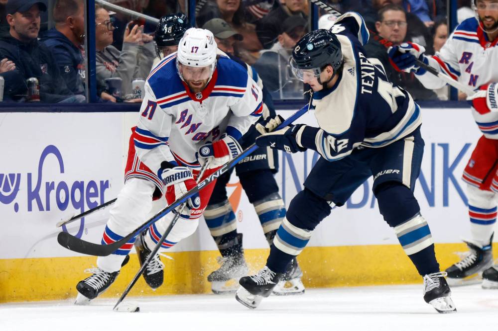 Watching an NHL game between the benches: Sights, sounds, danger