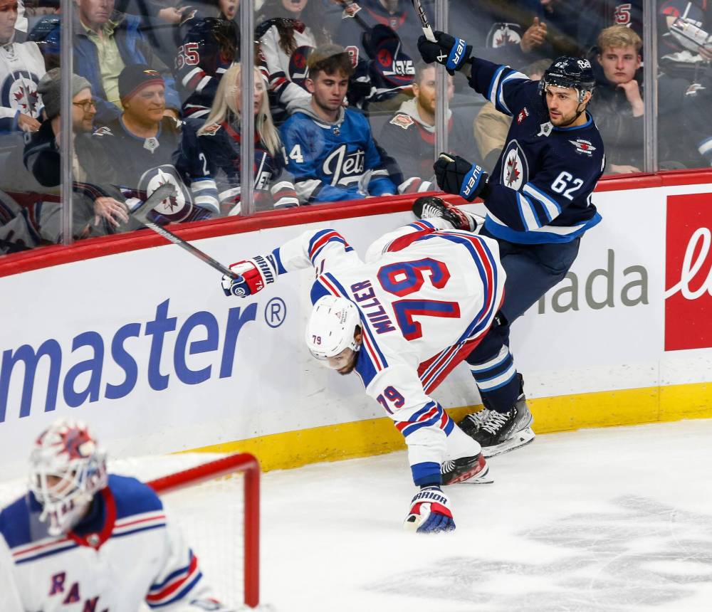 JOHN WOODS / WINNIPEG FREE PRESS
Winnipeg Jets’ Nino Niederreiter (62) and New York Rangers’ K’Andre Miller (79) collide during the first period.