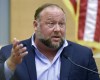 FILE - Conspiracy theorist Alex Jones takes the witness stand to testify at the Sandy Hook defamation damages trial at Connecticut Superior Court in Waterbury, Conn. Thursday, Sept. 22, 2022. A bank recently shut down the accounts of Jones' media company citing unauthorized transactions — a move that caused panic at the business when its balances suddenly dropped from more than $2 million to zero, according to a bankruptcy lawyer for the company. (Tyler Sizemore/Hearst Connecticut Media via AP, Pool, File)