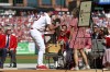 St. Louis Cardinals' Adam Wainwright is gifted a puppy as he is honored during his retirement ceremony before the Cardinals' final regular season baseball game Sunday, Oct. 1, 2023, against the Cincinnati Reds in St. Louis. (AP Photo/Scott Kane)