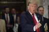 Former President Donald Trump speaks to reporters as he leaves the courtroom during a lunch break in his civil business fraud trial, Wednesday, Oct. 4, 2023, in New York. (AP Photo/Mary Altaffer)