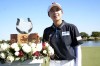 Kim Hyo-joo, of South Korea, poses with the trophy after winning the LPGA The Ascendant golf tournament in The Colony, Texas, Texas, Sunday, Oct. 8, 2023. (AP Photo/LM Otero)