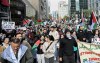 Police are warning the public that there will be no tolerance for violence or hate crimes ahead of an expected large-scale demonstration in solidarity with the Palestinian community in downtown Toronto. People take part in a protest for Palestine in Montreal, Sunday, October 8, 2023. THE CANADIAN PRESS/Graham Hughes