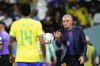 FILE - Brazil's head coach Tite throws the ball to Eder Militao during the World Cup quarterfinal soccer match between Croatia and Brazil, at the Education City Stadium in Al Rayyan, Qatar, Friday, Dec. 9, 2022. The former Brazil coach took over at Flamengo on Monday, Oct. 9, 2023, signing a contract that will run until the end of 2024.(AP Photo/Manu Fernandez, File)