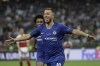 FILE - Chelsea's Eden Hazard celebrates after scoring his side's fourth goal during the Europa League Final soccer match between Arsenal and Chelsea at the Olympic stadium in Baku, Azerbaijan, Wednesday, May 29, 2019. Eden Hazard announced his retirement from all soccer on Tuesday, Oct. 10, 2023. The 32-year-old Hazard is putting an end to a 16-year-old injury-hit career marked by success at club level and unfulfilled promise with the Belgium national team's “Golden Generation.” (AP Photo/Luca Bruno, File)