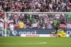 VfB Stuttgart's Serhou Guirassy, second from left, scores his side's equalizing goal during a Bundesliga soccer match between VfB Stuttgart and Wolfsburg, in Stuttgart's MHPArena, Germany, Saturday, Oct. 7, 2023. VfB Stuttgart won 3-1 and Guirassy scored all three goals. (Christoph Schmidt/dpa via AP)