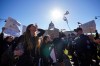 People attend competing rallies in support of, and opposing the Saskatchewan government's proposed legislation on pronoun policy in front of the Saskatchewan Legislative Building in Regina on Tuesday, Oct. 10, 2023. The Saskatchewan government plans to invoke the notwithstanding clause to override a judge’s injunction and introduce legislation about the province’s pronoun policy in school. THE CANADIAN PRESS/Heywood Yu