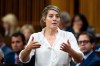 Mélanie Joly, Minister of Foreign Affairs, rises during Question Period on Parliament Hill in Ottawa, on Thursday, Oct. 5, 2023. Foreign Affairs Minister Mélanie Joly says Ottawa is planning to airlift Canadian citizens, permanent residents, their spouses and their children out of Tel Aviv in 