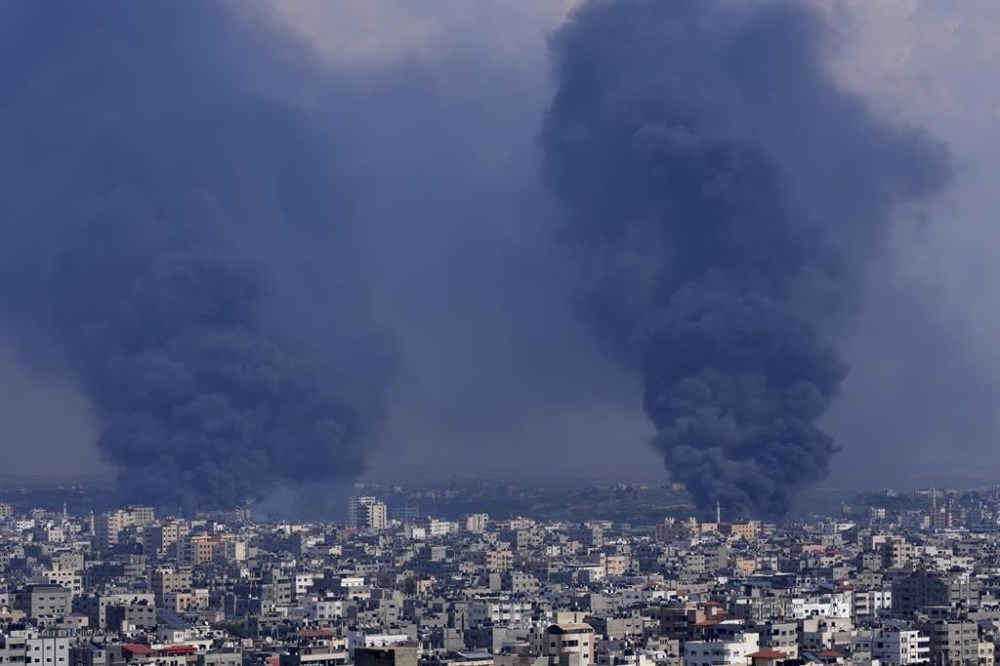 Smoke rises following Israeli airstrikes in Gaza City, Wednesday, Oct. 11, 2023. The militant Hamas rulers of the Gaza Strip carried out an unprecedented, multi-front attack on Israel at daybreak Saturday, firing thousands of rockets as dozens of Hamas fighters infiltrated the heavily fortified border in several locations, killing hundreds and taking captives. Palestinian health officials reported hundreds of deaths from Israeli airstrikes in Gaza. (AP Photo/Adel Hana)