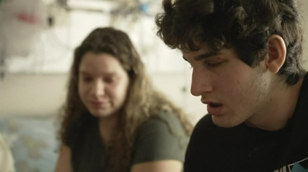 This still image provided by ABC News/Good Morning America shows. Rotem Mathias, 16, right, is interviewed on ABC's Good Morning America at a hospital in southern Israel on Wednesday, Oct. 11, 2023. The Israeli-American teenager survived an attack on his home from Hamas fighters over the weekend after his parents shielded him from the gunfire but were killed themselves.(ABC News/Good Morning America via AP)