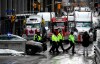 Police officers patrol on foot along Albert Street as a protest against COVID-19 restrictions marked by gridlock and the sound of truck horns reached its 14th day, in Ottawa on Thursday, Feb. 10, 2022. The court is expected to hear from Ottawa locals who lived in the midst of the 