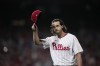 Philadelphia Phillies starting pitcher Aaron Nola tips his hat after being relieved during the sixth inning of Game 3 of a baseball NL Division Series against the Atlanta Braves Wednesday, Oct. 11, 2023, in Philadelphia. (AP Photo/Matt Slocum)
