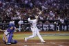 Arizona Diamondbacks' Gabriel Moreno watches his home run during the third inning in Game 3 of a baseball NL Division Series against the Los Angeles Dodgers, Wednesday, Oct. 11, 2023, in Phoenix. (AP Photo/Ross D. Franklin)