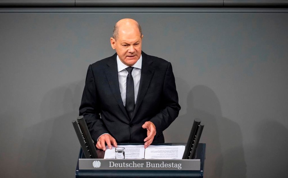 German Chancellor Olaf Scholz delivers a government statement on the situation in Israel during a meeting of the German federal parliament, Bundestag, at the Reichstag building in Berlin, Germany, Thursday, Oct. 12, 2023. (Michael Kappeler/dpa via AP)