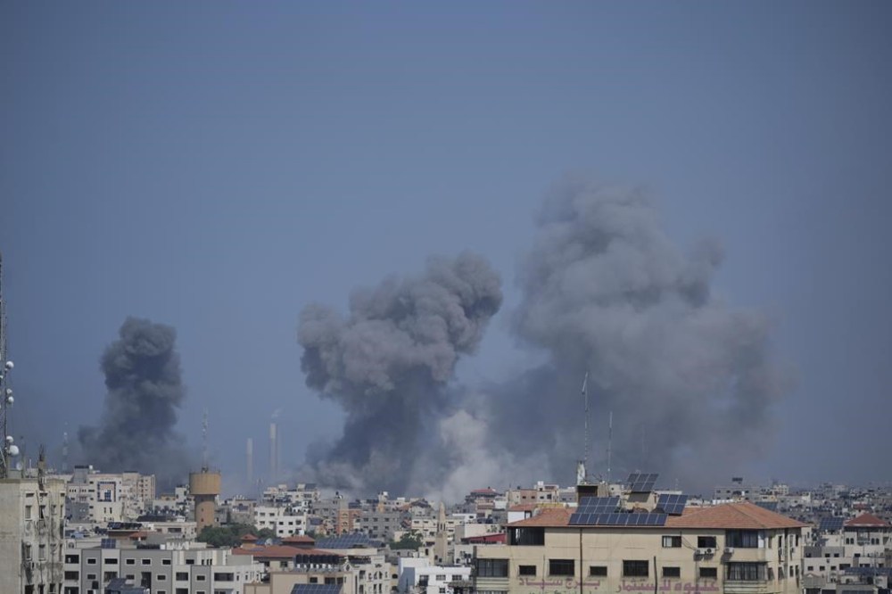 Smoke rises following an Israeli airstrike in Gaza City, Thursday, Oct. 12, 2023. THE CANADIAN PRESS/AP/Hatem Moussa