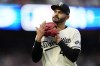 Minnesota Twins starting pitcher Pablo Lopez walks off the field after being relieved during the sixth inning in Game 1 of an AL wild-card baseball playoff series against the Toronto Blue Jays Tuesday, Oct. 3, 2023, in Minneapolis. (AP Photo/Abbie Parr)