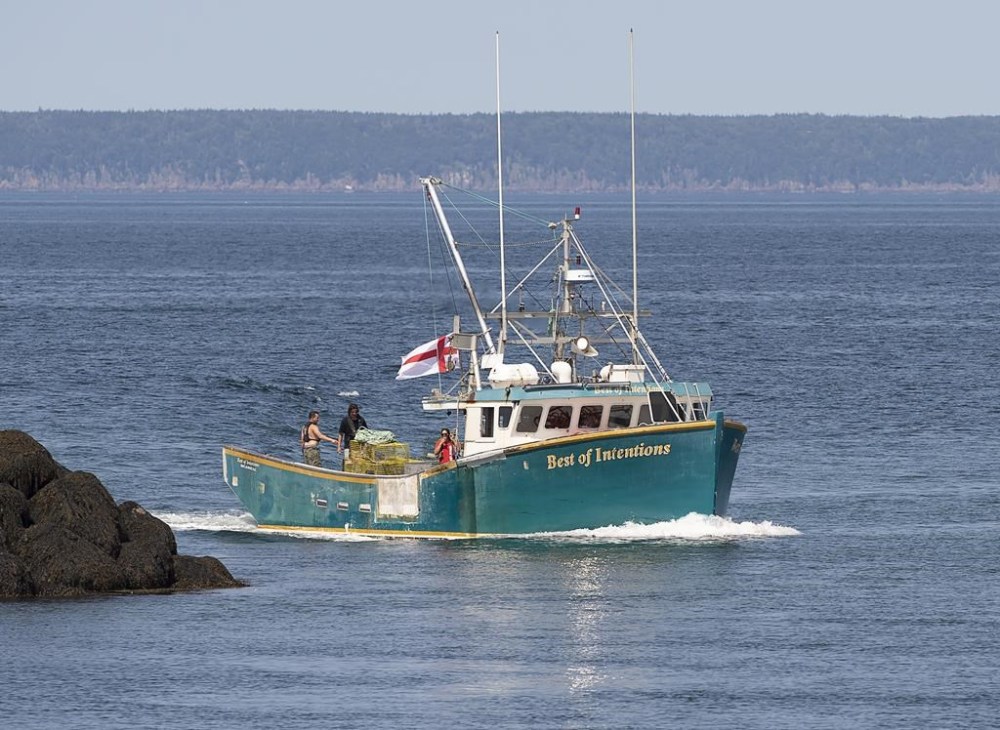 A fishing boat from the Sipekne'katik First Nation prepares for the start of its self-regulated treaty lobster fishery in Saulnierville, N.S. on August 16, 2021. Three years after a First Nation in Nova Scotia started a self-regulated lobster fishery that sparked protests and violence, federal prosecutors are pushing ahead with court cases against dozens of Indigenous fishers, some of whom are sure to launch constitutional challenges. THE CANADIAN PRESS/Andrew Vaughan