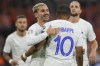 France's Kylian Mbappe, centre right, celebrates after scoring his side's opening goal during the Euro 2024 group B qualifying soccer match between The Netherlands and France at the Johan Cruyff ArenA stadium in Amsterdam, Netherlands, Friday, Oct. 13, 2023. (AP Photo/Peter Dejong)