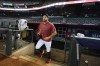Arizona Diamondbacks' Tommy Pham walks onto the field for practice Friday, Oct. 13, 2023, at Chase Field in Phoenix as the team prepares to play against the Philadelphia Phillies in the baseball NL Championship Series starting Monday. (AP Photo/Ross D. Franklin)