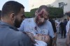 Palestinians wounded in Israeli air strikes on the Gaza Strip are brought to al-Aqsa hospital in Deir el-Balah City, Gaza Strip, Saturday, Oct. 14, 2023. (AP Photo/Hatem Moussa)