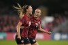 Canada's Jordyn Huitema, 9, celebrates her goal with teammate Julia Grosso during second half CONCACAF women's championship soccer series match against Jamaica in Toronto on Tuesday Sept. 26, 2023. THE CANADIAN PRESS/Nathan Denette