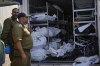 The bodies of Israelis killed in an unprecedented Hamas attack are gathered for identification at a military base in Ramla, Israel, Friday, Oct. 13, 2023. Israeli officials say 1,300 people were killed when Hamas militants burst across the border last Saturday and went on a deadly rampage through Israeli border towns, villages, army bases and a music festival. (AP Photo/Francisco Seco)
