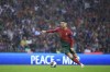 Portugal's Cristiano Ronaldo runs with the ball during the Euro 2024 group J qualifying soccer match between Portugal and Slovakia at the Dragao stadium in Porto, Portugal, Friday, Oct. 13, 2023. (AP Photo/Luis Vieira)