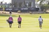 Captain Brooks Koepka, of Smash GC, and Talor Gooch, of RangeGoats GC, walk down the 18th fairway during the playoff round of the LIV Golf Jeddah tournament at the Royal Greens Golf & Country Club on Sunday, Oct. 15, 2023 in King Abdullah Economic City, Saudi Arabia. (Photo by Chris Trotman/LIV Golf via AP)