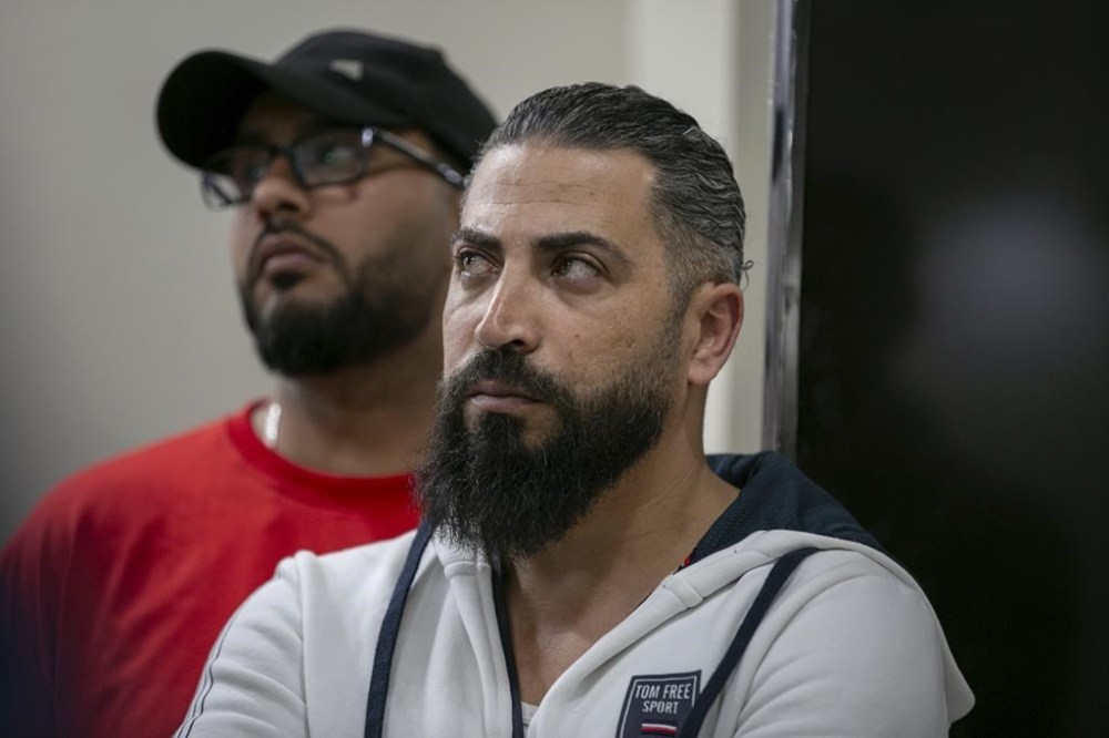 Oday Al-Fayoume, father of Wadea Al-Fayoume, 6, attends a news conference at the Muslim Community Center on Chicago's Northwest Side, Sunday, Oct. 15, 2023. Authorities say a 71-year-old Illinois man has been charged with a hate crime, accused of fatally stabbing a 6-year-old boy and seriously wounding a 32-year-old woman, in Plainfield Township, because of their Islamic faith and the Israel-Hamas war. The Council on American-Islamic Relations identified the victims as Wadea Al-Fayoume and his mother. (Jim Vondruska/Chicago Sun-Times via AP)