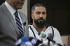 Oday Al-Fayoume, father of Wadea Al-Fayoume, 6, attends a news conference at the Muslim Community Center on Chicago's Northwest Side, Sunday, Oct. 15, 2023. Authorities say a 71-year-old Illinois man has been charged with a hate crime, accused of fatally stabbing a 6-year-old boy and seriously wounding a 32-year-old woman, in Plainfield Township, because of their Islamic faith and the Israel-Hamas war. The Council on American-Islamic Relations identified the victims as Wadea Al-Fayoume and his mother. (Jim Vondruska/Chicago Sun-Times via AP)