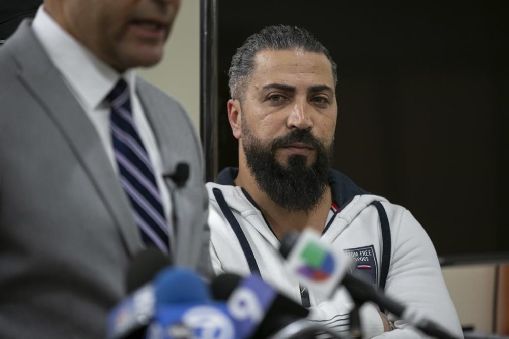 Oday Al-Fayoume, father of Wadea Al-Fayoume, 6, attends a news conference at the Muslim Community Center on Chicago's Northwest Side, Sunday, Oct. 15, 2023. Authorities say a 71-year-old Illinois man has been charged with a hate crime, accused of fatally stabbing a 6-year-old boy and seriously wounding a 32-year-old woman, in Plainfield Township, because of their Islamic faith and the Israel-Hamas war. The Council on American-Islamic Relations identified the victims as Wadea Al-Fayoume and his mother. (Jim Vondruska/Chicago Sun-Times via AP)