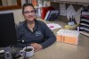 With her election binder at her side, Michelle Bartoletti, the Suamico Village clerk, poses for a photo in her office on Tuesday, Sept. 26, 2023, in Suamico, Wis. (AP Photo/Mike Roemer)