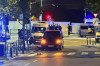 Police cordon off an area where a shooting took place in the center of Brussels, Monday, Oct. 16, 2023. Belgian police say that two people are dead in central Brussels after several shots were fired. (AP Photo/Sylvain Plazy)