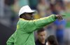 FILE - Zimbabwe's coach Shadreck Mlauzi gives instructions to his players during a group F match of the women's Olympic football tournament between Canada and Zimbabwe in Sao Paulo, Brazil, Saturday, Aug. 6, 2016. The temporary head of the Zimbabwe Football Association will wait to hear from the police before deciding on the future of women’s soccer team coach Shadreck Mlauzi after he was charged with sexual assault, it was reported on Tuesday, Oct. 17, 2023. (AP Photo/Nelson Antoine, File)