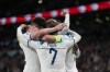 England players celebrate after Harry Kane scored their third goal during the Euro 2024 group C qualifying soccer match between England and Italy at Wembley stadium in London, Tuesday, Oct. 17, 2023. (AP Photo/Kirsty Wigglesworth)
