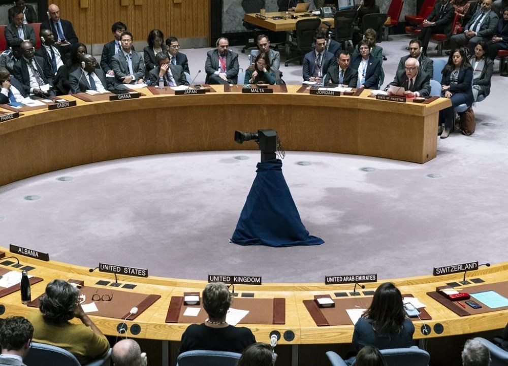 Palestinian U.N. Ambassador Riyad Mansour, background right, addresses members of the U.N. Security Council at United Nations headquarters Monday, Oct. 16, 2023. (AP Photo/Craig Ruttle)