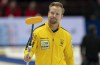 Swedish skip Niklas Edin acknowledges the crowd as he leaves the ice after being eliminated from competition by Team Canada at the Men's World Curling Championship in Ottawa on April 8, 2023. THE CANADIAN PRESS/Adrian Wyld