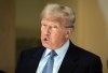 Former President Donald Trump comments to the media during a break of his civil business fraud trial at New York Supreme Court, Wednesday, Oct. 18, 2023, in New York. (AP Photo/Seth Wenig)