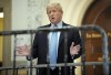 Former President Donald Trump speaks as he returns to the courtroom after the lunch break of his civil business fraud trial, Wednesday, Oct. 18, 2023, at New York Supreme Court in New York. (AP Photo/Seth Wenig)