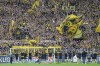 Dortmund's players celebrate with fans after winning the German Bundesliga soccer match between Borussia Dortmund and Union Berlin in Dortmund, Germany, Saturday, Oct. 7, 2023. (AP Photo/Martin Meissner)