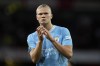 Manchester City's Erling Haaland applauds to supporters after his team lost the English Premier League soccer match between Arsenal and Manchester City at the Emirates Stadium in London, Sunday, Oct. 8, 2023.(AP Photo/Kirsty Wigglesworth)