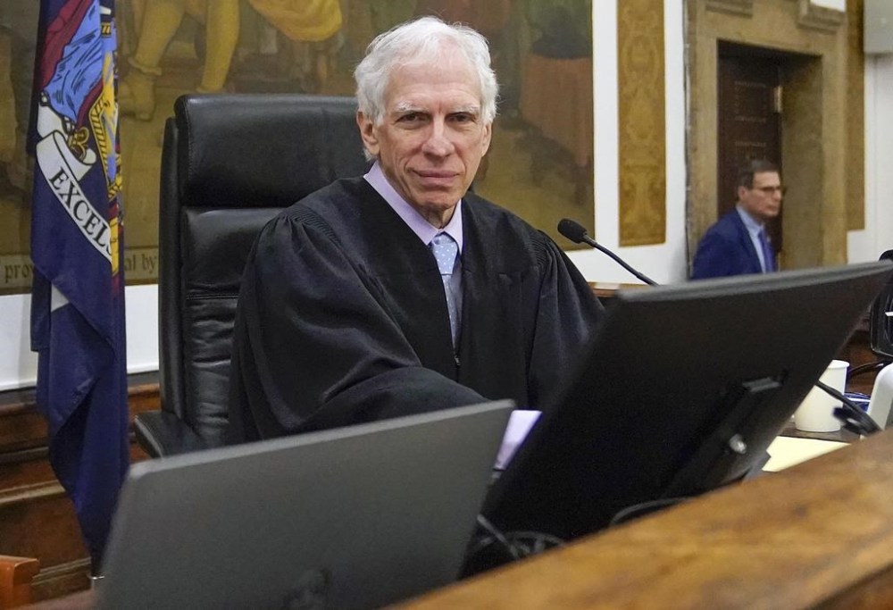 FILE - Judge Arthur Engoron sits on the bench in the courtroom before the start of a civil business fraud trial against the Trump Organization, Oct. 4, 2023, at Supreme Court in New York. Judge Engoron threatened Friday, Oct. 20, 2023, to hold Donald Trump in contempt, raising the possibility of fining or even jailing the former president because his disparaging social media post about a key court staffer remained visible for weeks on his campaign website after the judge ordered it deleted. (AP Photo/Mary Altaffer, Pool, File)