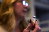 FILE - Becky Hormuth holds a vial of testosterone Wednesday, Sept. 20, 2023, in Wentzville, Mo. A judge agreed Friday, Oct. 20, to step aside in a lawsuit that seeks to overturn a new Missouri law banning gender-affirming health care for minors, despite what he called “gamesmanship” from the plaintiffs' lawyers who sought a new judge. (AP Photo/Jeff Roberson, File)