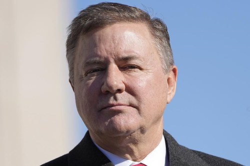 FILE - Oklahoma Attorney General Gentner Drummond stands during the playing of the national anthem at the inauguration ceremonies, Jan. 9, 2023, in Oklahoma City. Oklahoma's Republican Attorney General Gentner Drummond on Friday, Oct. 20, 2023, sued to stop a state board from establishing and funding what would be the nation's first religious public charter school after the board ignored Drummond's warning that it would violate both the state and U.S. constitutions. (AP Photo/Sue Ogrocki, File)