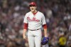 Philadelphia Phillies relief pitcher Jeff Hoffman celebrates during the fourth inning in Game 4 of the baseball NL Championship Series against the Arizona Diamondbacks in Phoenix, Friday, Oct. 20, 2023. (AP Photo/Brynn Anderson)