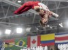 Team Canada William Emard looks for the bar as he soars through the air in the men's gymnastics team event at the Pan American Games in Santiago, Chile on Saturday Oct. 21, 2023. THE CANADIAN PRESS/Frank Gunn