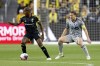 Columbus Crew midfielder Darlington Nagbe, left, controls the ball in front of CF Montreal midfielder Samuel Piette during the first half of an MLS soccer match in Columbus, Ohio, Saturday, Oct. 21, 2023. (AP Photo/Paul Vernon)