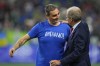 Vancouver Whitecaps coach Vanni Sartini, left, greets Seattle Sounders coach Brian Schmetzer before an MLS soccer match Saturday, Oct. 7, 2023, in Seattle. (AP Photo/Lindsey Wasson)