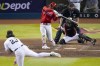 Philadelphia Phillies' Bryce Harper hits a home run off Arizona Diamondbacks starting pitcher Zac Gallen during the sixth inning in Game 5 of the baseball NL Championship Series in Phoenix, Saturday, Oct. 21, 2023. (AP Photo/Rick Scuteri)